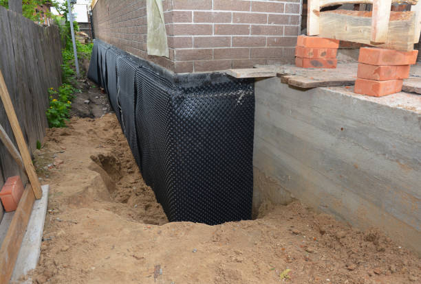 Happy homeowners after waterproofing job in Port Monmouth